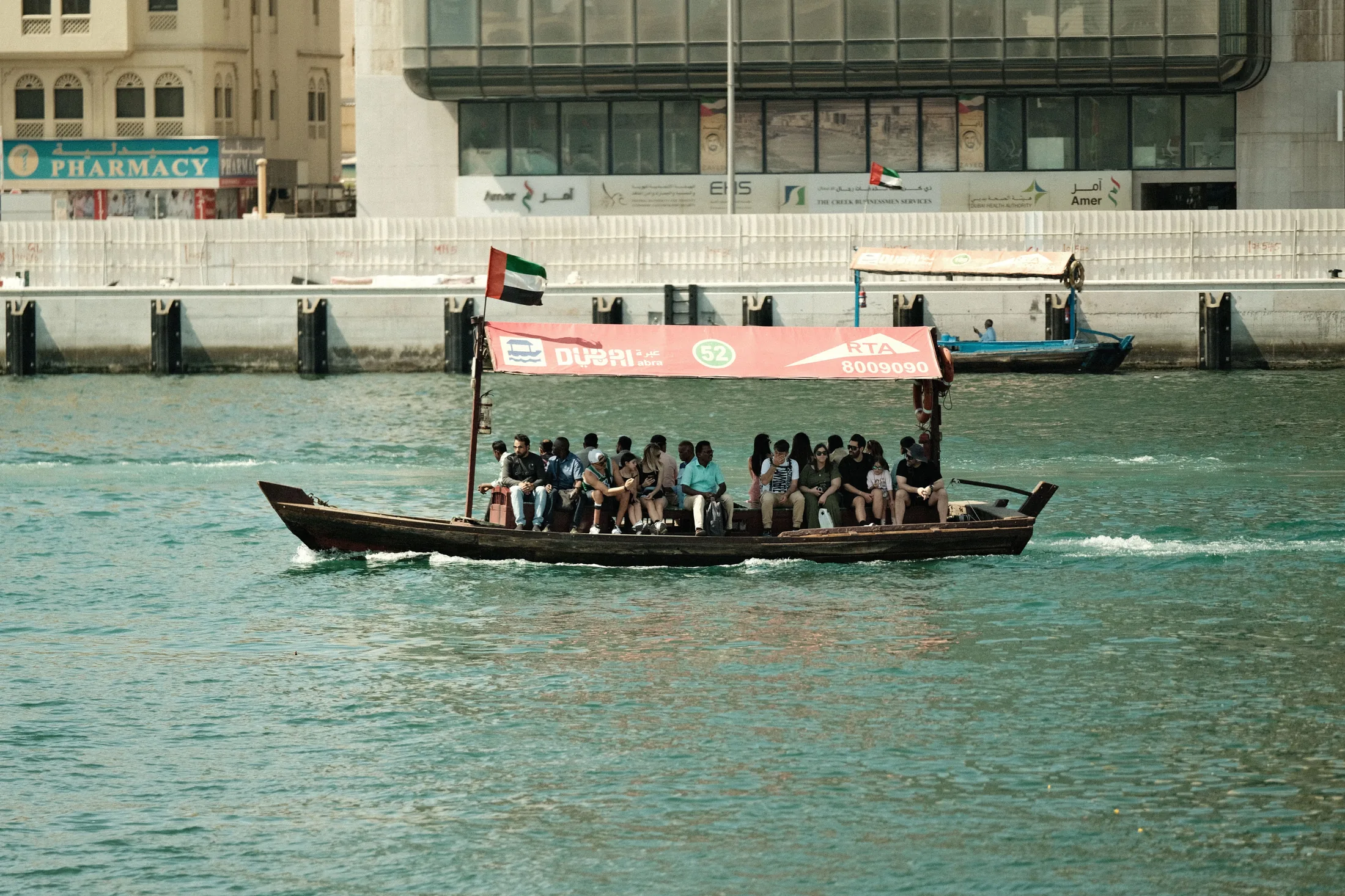 Dubai Creek abra crossing at golden hour