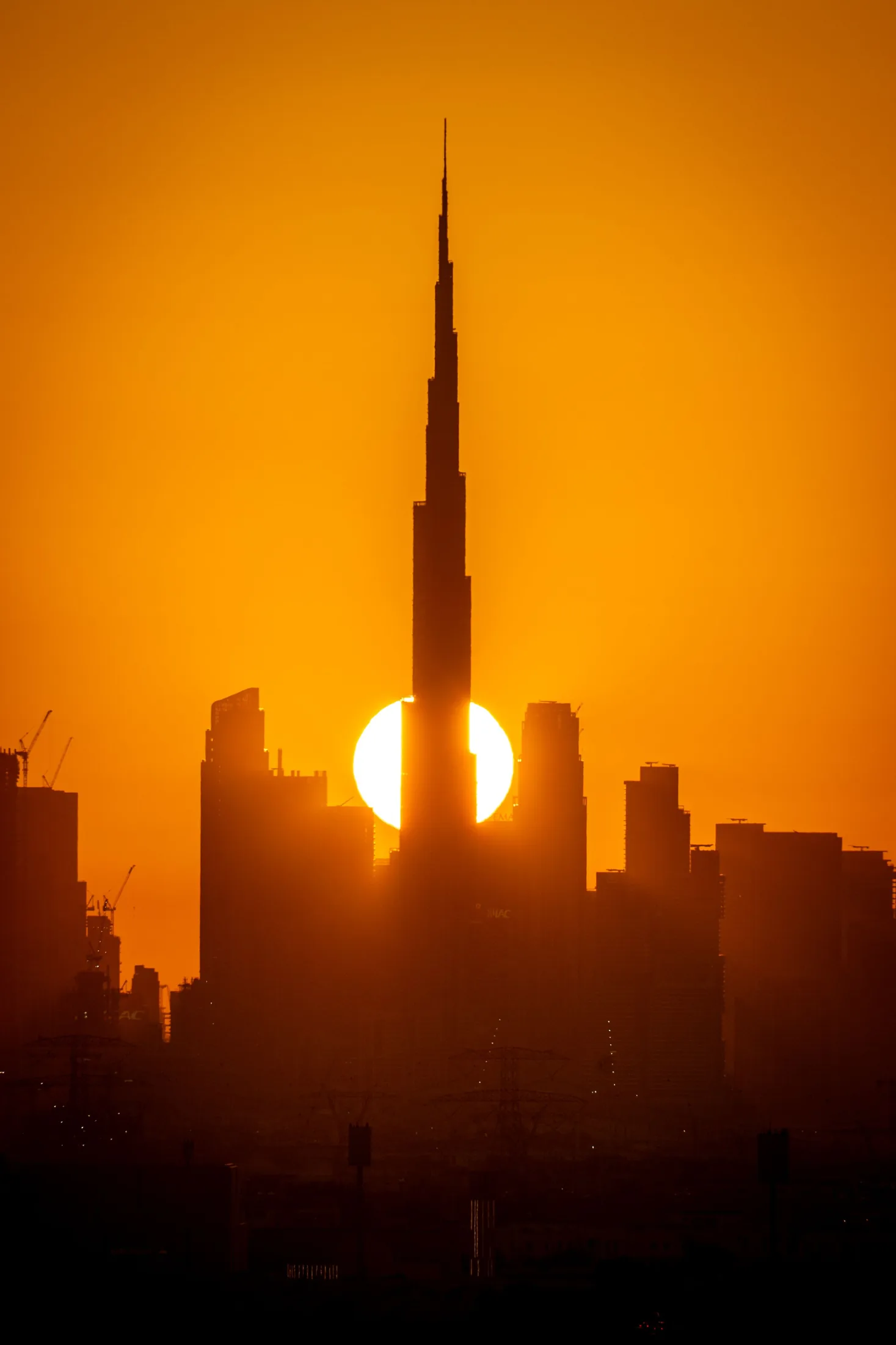 Burj Khalifa and the Downtown Dubai skyline at sunset